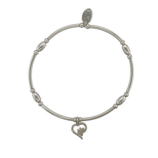 This pre-owned Clogau Affinity Pawprint Heart bracelet is a charming sterling silver design, combining a comfortable stretchy style with a meaningful pawprint and heart motif.
Design: Featuring the Clogau Affinity design with a pawprint heart detail, this bracelet offers a meaningful way to celebrate a much-loved pet. The stretchy design makes it easy to wear, while the polished silver finish gives it a simple and versatile look for everyday styling.
Material: Made from 925 sterling silver.