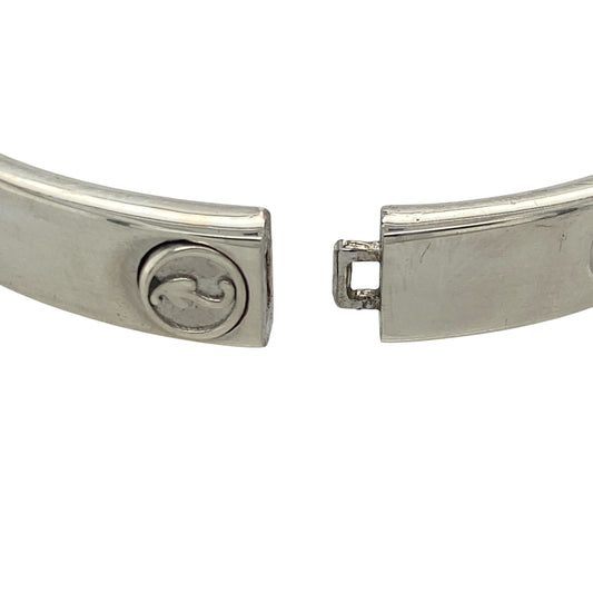 This pre-owned Clogau Tree of Life Insignia bangle is a substantial design, combining 925 silver with signature 9ct rose gold detailing.
Design: Featuring Clogau's recognisable Tree of Life Insignia design, this bangle combines silver with contrasting rose gold detailing for a distinctive two-tone finish.
Material: Made from 925 silver with 9-carat rose gold detailing.
Bangle Detail: Tree of Life Insignia design measuring approximately 7mm wide with a diameter of approximately 6cm.