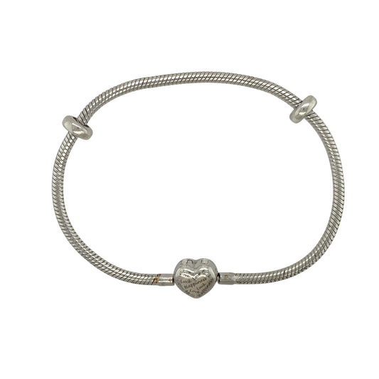 This pre-owned Clogau charm bracelet is a classic two-tone design, combining 925 silver with signature 9ct rose gold detailing and a meaningful heart-shaped clasp.
Design: Featuring a traditional charm bracelet design, this Clogau bracelet has a heart-shaped clasp detailed with the words "Love, Luck and Happiness", adding a meaningful finishing touch to the piece.
Material: Made from 925 silver with 9-carat rose gold detailing.