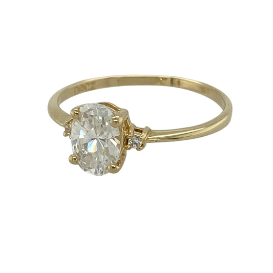 This pre-owned 14ct yellow gold cubic zirconia solitaire ring is a classic stone-set design, featuring an oval centre stone with smaller cubic zirconia detailing on either side.
Design: Featuring an oval cubic zirconia centre stone with a smaller round stone set on either side, this ring has a classic design finished in warm 14ct yellow gold.
Material: Made from 14-carat yellow gold.