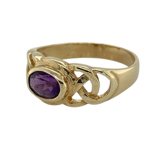 This pre-owned 9ct yellow gold amethyst Celtic Knot band ring is a distinctive gemstone design, combining traditional Celtic-inspired detailing with a rich purple amethyst.
Design: Featuring an oval amethyst centre stone with decorative Celtic Knot detailing, this band ring is finished in warm 9ct yellow gold.
Material: Made from 9-carat yellow gold.
Gemstone Detail: Oval amethyst stone measuring approximately 7mm by 5mm.
Ring Detail: Celtic Knot band ring design.