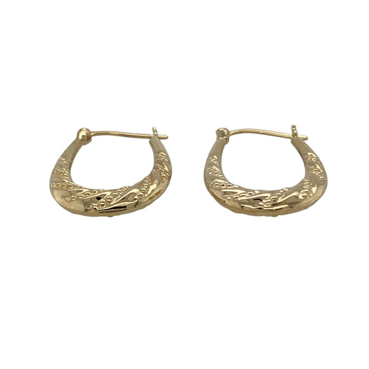These pre-owned 9ct yellow gold patterned twisted oval creole earrings are a decorative design, featuring a combination of patterned and twisted detailing.
Design: Featuring an oval creole shape with patterned twisted detailing, these earrings have a decorative finish in warm 9ct yellow gold.
Material: Made from 9-carat yellow gold.
Earring Detail: Patterned twisted oval creole earring design.
Size & Weight: Total weight 1.50 grams.