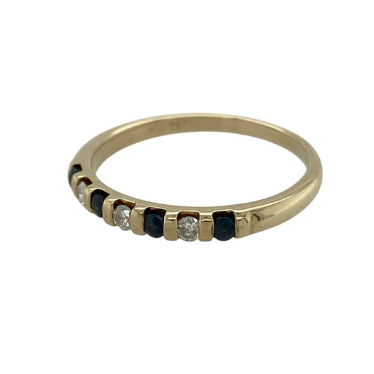 This pre-owned 9ct yellow gold diamond and sapphire band ring is a classic gemstone design, combining rich blue sapphires with diamond detailing.
Design: Featuring sapphire and diamond detailing across the front of the band, this ring combines rich blue tones with the warm finish of 9ct yellow gold.
Material: Made from 9-carat yellow gold.
Gemstone Detail: Set with sapphires and diamonds.
Ring Detail: Front of the band measures approximately 2.5mm wide.
Size & Weight: Ring size P. Total weight 1.80 grams.