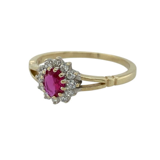 This pre-owned 9ct yellow gold ruby and cubic zirconia cluster ring is a classic gemstone design, featuring an oval ruby centre stone surrounded by cubic zirconia.
Design: Featuring an oval ruby centre stone surrounded by cubic zirconia in a cluster setting, this ring combines rich red tones with the warm finish of 9ct yellow gold.
Material: Made from 9-carat yellow gold.
Gemstone Detail: Oval ruby centre stone measuring approximately 5mm by 4mm, surrounded by cubic zirconia stones.
