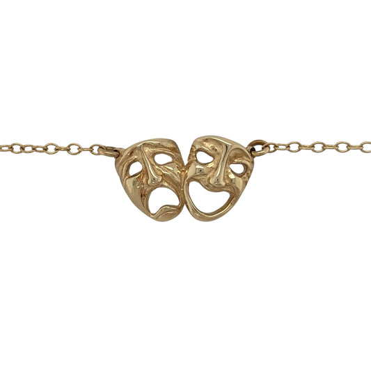 This pre-owned 9ct yellow gold comedy and tragedy theatre faces necklace is a distinctive design, featuring the iconic theatrical masks representing comedy and tragedy.
Design: Featuring the traditional comedy and tragedy theatre face motifs, this necklace has a distinctive performing arts-inspired design finished in warm 9ct yellow gold.
Material: Made from 9-carat yellow gold.
Necklace Detail: Features the iconic comedy and tragedy theatre masks.