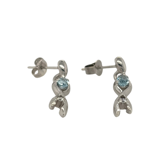 This pre-owned 9ct white gold diamond and aqua drop earrings are an elegant design, featuring teardrop-shaped aqua stones complemented by diamond detailing.
Design: Featuring a classic drop design, these earrings combine teardrop-shaped aqua stones with diamond detailing in 9ct white gold.
Material: Made from 9-carat white gold.
Gemstone Detail: Set with teardrop-shaped aqua stones measuring approximately 5mm by 3mm each, complemented by diamond detailing.