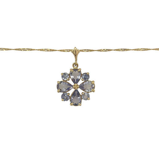 This pre-owned 14ct yellow gold tanzanite flower pendant necklace is a pretty gemstone design, featuring a floral-inspired pendant on a classic Singapore chain.
Design: Featuring a flower-shaped pendant set with tanzanite stones, this necklace has a delicate floral design finished in warm 14ct yellow gold.
Material: Made from 14-carat yellow gold.
Gemstone Detail: Set with tanzanite stones arranged to create the flower design.
