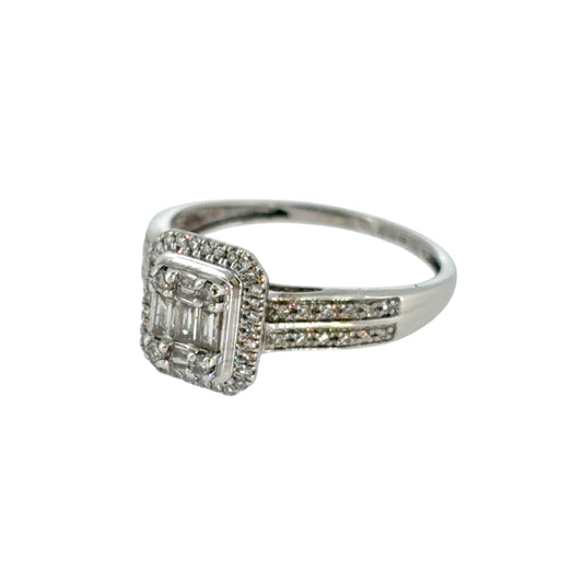 This pre-owned 9ct white gold diamond halo cluster ring is a detailed design, featuring a combination of brilliant and baguette cut diamonds with diamond-set shoulders.
Design: Featuring a halo cluster design, this ring combines brilliant and baguette cut diamonds across the centre, complemented by two rows of diamonds along the shoulders.
Material: Made from 9-carat white gold.