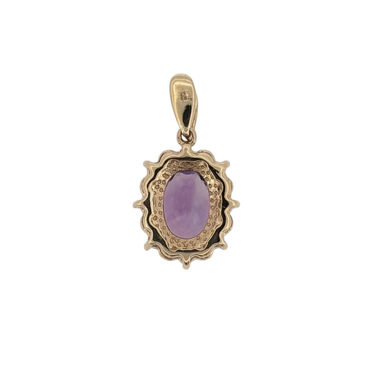 Add rich purple colour to your jewellery collection with this pre-owned 9ct yellow gold amethyst and cubic zirconia cluster pendant, featuring a prominent oval amethyst surrounded by bright cubic zirconia stones.
Design: The pendant features an oval amethyst at the centre, surrounded by cubic zirconia stones in a classic cluster design that beautifully frames the central gemstone.