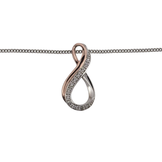 Add a meaningful Clogau piece to your jewellery collection with this pre-owned Infinity pendant necklace, combining 925 sterling silver, 9ct rose gold detailing and white topaz in an elegant two-tone design.
Design: The pendant features a flowing infinity symbol, creating a timeless design associated with everlasting love and connection.
Material: Made from 925 sterling silver with 9-carat rose gold Clogau detailing, the contrasting metals highlight the curves of the infinity design.