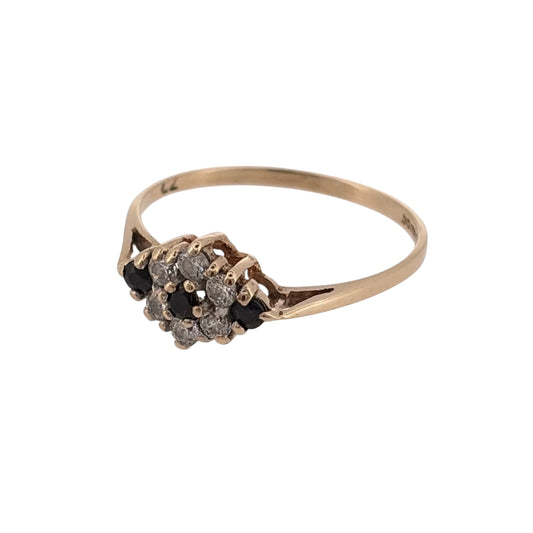 Add a classic touch to your jewellery collection with this pre-owned 9ct yellow gold sapphire and cubic zirconia cluster ring, featuring beautiful blue sapphire and cubic zirconia detailing.
Design: The ring features a traditional cluster design, combining sapphire and cubic zirconia stones to create an elegant and attractive appearance.
Material: Made from 9ct yellow gold, offering a warm gold finish that complements the blue sapphire.
