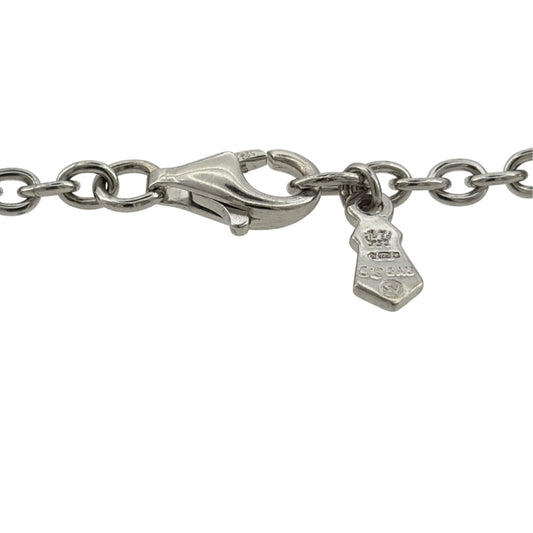 Add a meaningful touch of Welsh heritage to your jewellery collection with this pre-owned Clogau charm bracelet, combining 925 sterling silver with 9ct rose gold detailing and featuring four decorative charms.
Design: The bracelet features a classic link chain with four individual charms, creating an attractive and sentimental design inspired by nature, love and Welsh heritage.
Material: Made from 925 sterling silver with 9ct rose gold detailing, offering an elegant contrasting two-tone finish.
