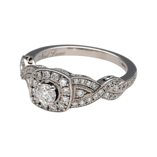 Experience designer elegance with this pre-owned 14ct white gold diamond 'Neil Lane' halo cluster ring, featuring an exquisite halo design with diamond-set twisted shoulders and exceptional sparkle throughout.
Design: This beautiful designer ring showcases a dazzling central diamond halo cluster, creating the appearance of a larger centrepiece while maximising brilliance.
