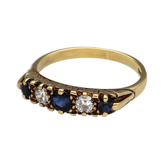 This pre-owned 18ct yellow gold diamond and sapphire band ring is a classic gemstone design, featuring sapphire and diamond detailing across the front of the band.
Design: Featuring a traditional gemstone band design, this ring combines sapphires and diamonds across the front in warm 18ct yellow gold.
Material: Made from 18-carat yellow gold.
Gemstone Detail: Set with sapphire and diamond detailing across the front of the ring.
Ring Detail: The front of the band measures approximately 4mm wide.