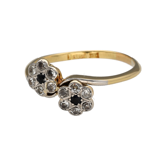Add a decorative piece to your jewellery collection with this pre-owned 18ct yellow gold diamond and sapphire flower cluster twist ring, featuring floral detailing and an elegant twisted design.
Design: The ring features flower-shaped diamond and sapphire clusters incorporated into a flowing twist design, creating a distinctive and timeless appearance.
Material: Made from 18ct yellow gold, offering a warm gold finish that complements the diamonds and sapphires.