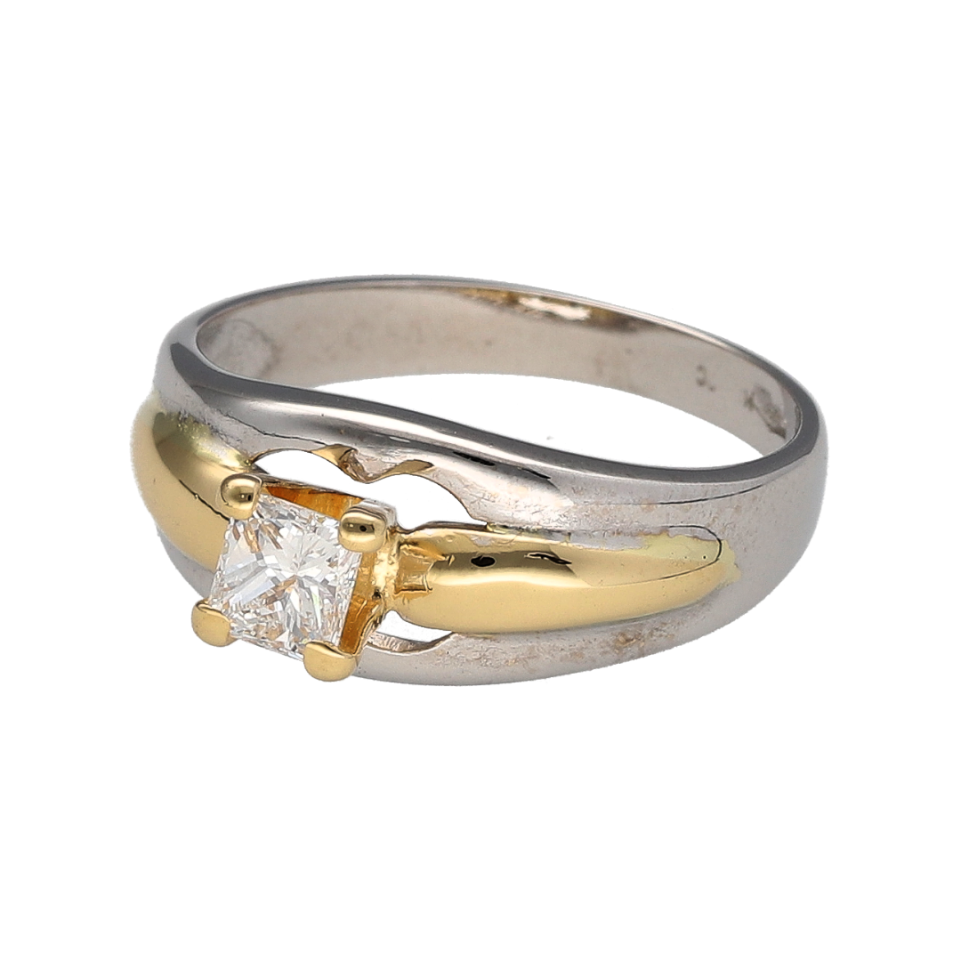 Add timeless sophistication to your collection with this pre-owned 18ct white gold solitaire ring, finished with yellow gold detail and a striking princess cut diamond.
Design: The ring features a single princess cut diamond of approximately 0.40ct, held in a clean and contemporary setting that highlights its elegant square shape.
Material: Made from 18-carat white gold with subtle yellow gold detailing, the two-tone design offers a refined contrast that enhances the brilliance of the diamond.