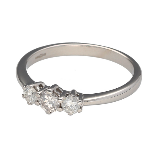 Bring timeless elegance and symbolic meaning to your collection with this pre-owned 18ct white gold trilogy ring, featuring three sparkling diamonds.
Design: The ring is styled with three brilliant-cut diamonds, totalling approximately 0.50ct, with an estimated clarity of Si–I1 and colour J–K.
Material: Made from 18-carat white gold, the polished finish enhances the cool tone of the metal and highlights the brilliance of the diamonds.