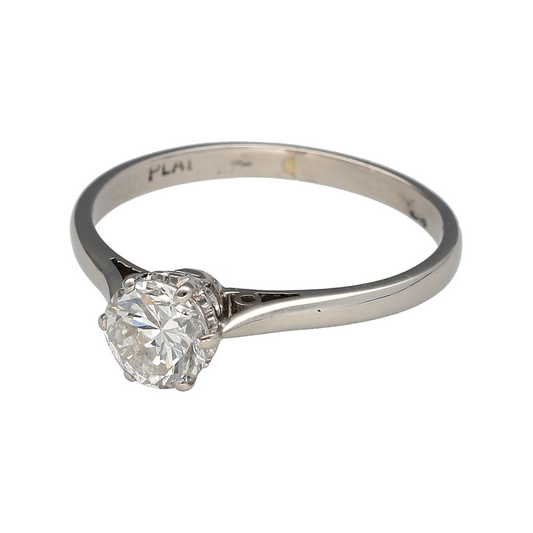 Bring refined brilliance and enduring elegance to your collection with this pre-owned platinum solitaire ring, featuring a sparkling brilliant-cut diamond.
Design: The ring showcases a single round brilliant-cut diamond of approximately 0.84ct, with an estimated clarity of Si and colour J–K, offering bright fire and timeless beauty.
Material: Made from platinum, the polished finish enhances the cool, durable metal and provides the perfect setting for the diamond.
