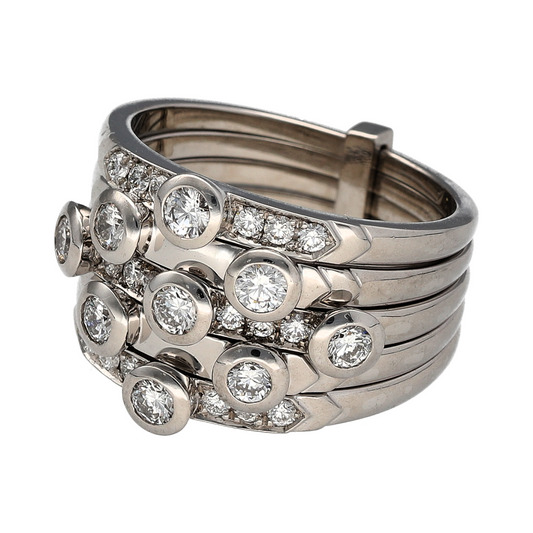 Bring bold luxury and contemporary elegance to your collection with this pre-owned 18ct white gold diamond set five-band raindrop ring—an exceptional statement piece with striking presence and refined sparkle.
Design: This eye-catching ring features a five-band raindrop or bubble-style design, with the front measuring approximately 15mm high. The flowing, sculptural form is pavé set with diamonds, creating a dynamic surface that catches the light beautifully and delivers a modern, high-impact look.