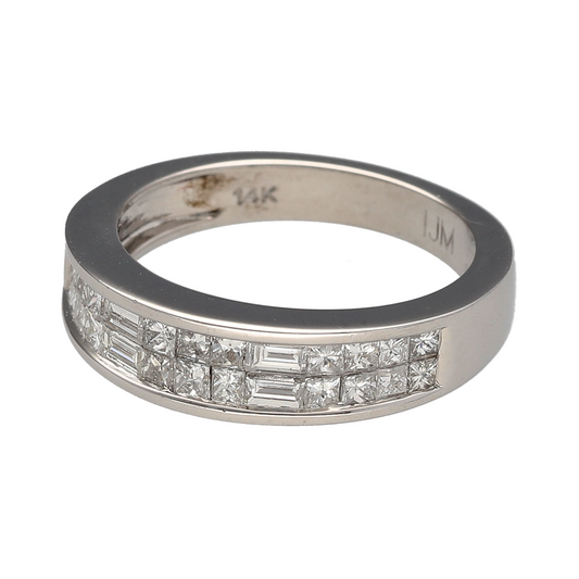 Add bold sparkle and contemporary elegance to your jewellery collection with this pre-owned 14ct white gold diamond band ring, offering strong presence and refined brilliance.
Design: This band ring features a front measuring approximately 5mm in width, showcasing a striking combination of baguette and princess cut diamonds arranged to create a clean, structured, and eye-catching look.