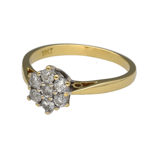 Add timeless sparkle and feminine elegance to your jewellery collection with this pre-owned 18ct yellow gold diamond set flower cluster ring—an eye-catching piece perfect for special occasions or refined everyday wear.
Design: The ring features a beautiful flower cluster arrangement, with carefully set diamonds forming a delicate floral silhouette. The clustered layout enhances light reflection, creating the illusion of a larger centre presence while maintaining a soft and elegant profile.