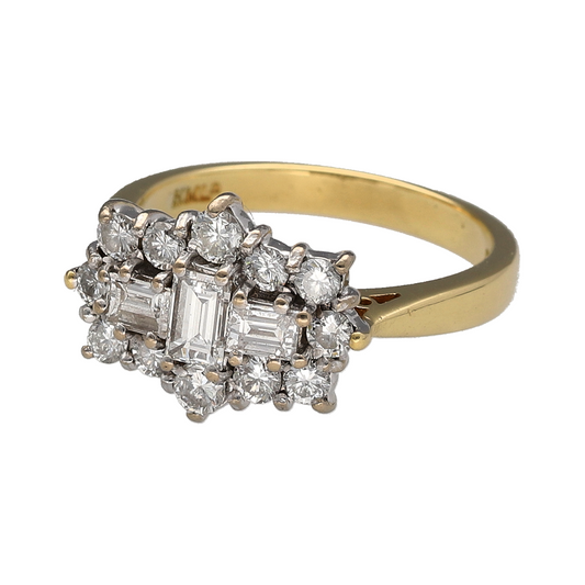 Add exceptional sparkle and timeless luxury to your jewellery collection with this pre-owned 18ct yellow gold diamond set cluster ring, featuring a stunning combination of baguette and brilliant cut diamonds with impressive statement appeal—perfect for special occasions, gifting, or sophisticated everyday wear.
Design: The ring showcases a striking diamond cluster arrangement measuring approximately 10mm high at the front, featuring a beautiful mix of baguette and brilliant cut diamonds.