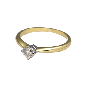 Preowned 18ct Yellow and White Gold & Diamond Set Solitaire Ring in size P with the weight 2.90 grams. The diamond is approximately 28pt and is approximate clarity Si2 - i1 and colour J - K