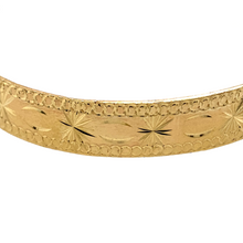 Load image into Gallery viewer, New 9ct Yellow Solid Gold Patterned Children&#39;s Bangle with the weight 13 grams. The width of the bangle is 9mm and the diameter is 5.5cm
