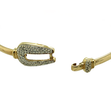 Load image into Gallery viewer, Preowned 9ct Yellow and White Gold &amp; Diamond Set Buckle Bangle with the weight 5.90 grams and the bangle width 3mm. The front of the buckle is 10mm high and the bangle has the diameter 6cm

