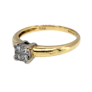 Preowned 18ct Yellow and White Gold & Diamond Princess Cut Illusion Set Solitaire Ring in size L with the weight 2.30 grams. There is approximately 20pt of Diamond content set in the ring
