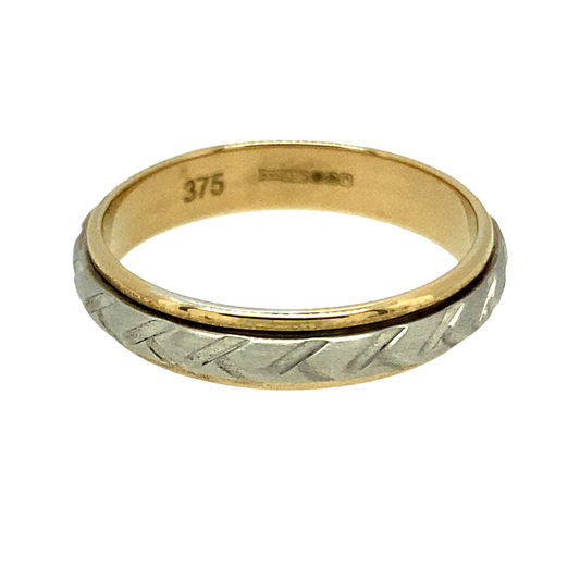 New 9ct Yellow and White Gold 4mm Patterned Band Ring in size N with the weight 2.40 grams. The white Gold band moves independently from the yellow Gold in a spinning movement