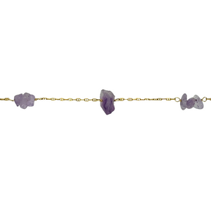 New 9ct Yellow Gold & Amethyst 16" Necklace on an anchor chain with the weight 5.60 grams. There are six tumbled stone chips and one raw stone in the center. The center stone is approximately 15mm by 8mm. Amethyst stones relieve stress, provides balance and soothes anxiety and fatigue 