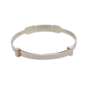 New Silver Diamond Cut Identity Expander Bangle with the weight 3.50 grams. The front of the bangle is 6mm wide and the rest of the bangle is 3mm wide. The bangle diameter is 3.9cm when closed and 5cm when fully expanded