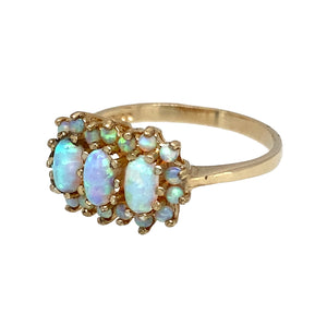 New 9ct Yellow Gold & Created Opal Cluster Ring in size P with the weight 2.20 grams. The center stones are 5mm by 3mm each