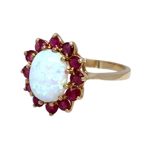 New 9ct Yellow Gold & Created Opal & Pink Stone Flower Cluster Ring in size O to P with the weight 2.90 grams. The center stone is 10mm by 8mm
