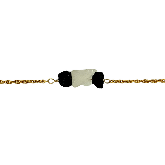 New 9ct Gold Quartz & Black Tourmaline raw stones on a 19" Prince of Wales chain with the weight 5.30 grams. The quartz stone is approximately 12mm by 9mm and the black tourmaline stone are each approximately 7mm by 6mm. The tourmaline stones are a favourite crystal for many as it provides healing energy and protects from negative emotions. The stones hold good intentions and is a grounding stone which protects you from anxiety. When worn with clear quartz the quartz can help amplify other stones.