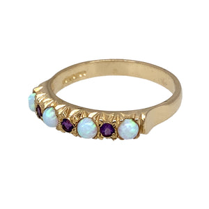 New 9ct Yellow Gold & Created Opal & Purple Stone Band Ring in various sizes with the weight 2.20 grams. The band is approximately 4mm wide at the front and the created opal stones are 3mm diameter each