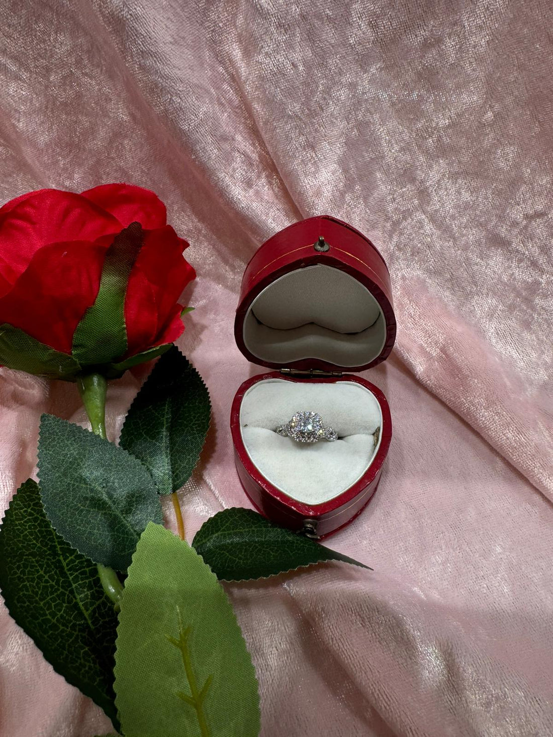 18ct white gold diamond vera wang halo ring in a red heart shaped jewellery box with a rose