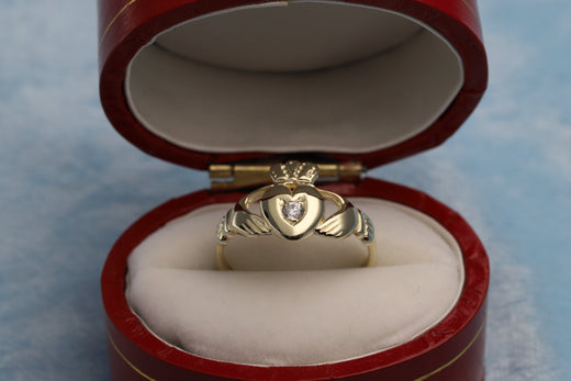 9ct Gold & Cubic Zirconia Set Claddagh Ring in a red jewellery ring box