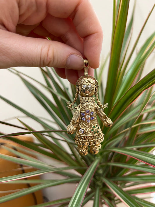 The History of Rag Doll Gold Pendants: A Timeless Jewellery Tradition
