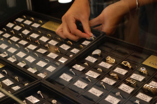 18ct gold and 9ct gold diamond and gemstone ring in jewellery ring trays