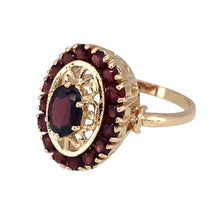 Load image into Gallery viewer, Preowned 9ct Yellow Gold &amp; Garnet Set Ring in size O with the weight 4.30 grams. The center stone is 7mm by 5mm and the front of the ring is 19mm high
