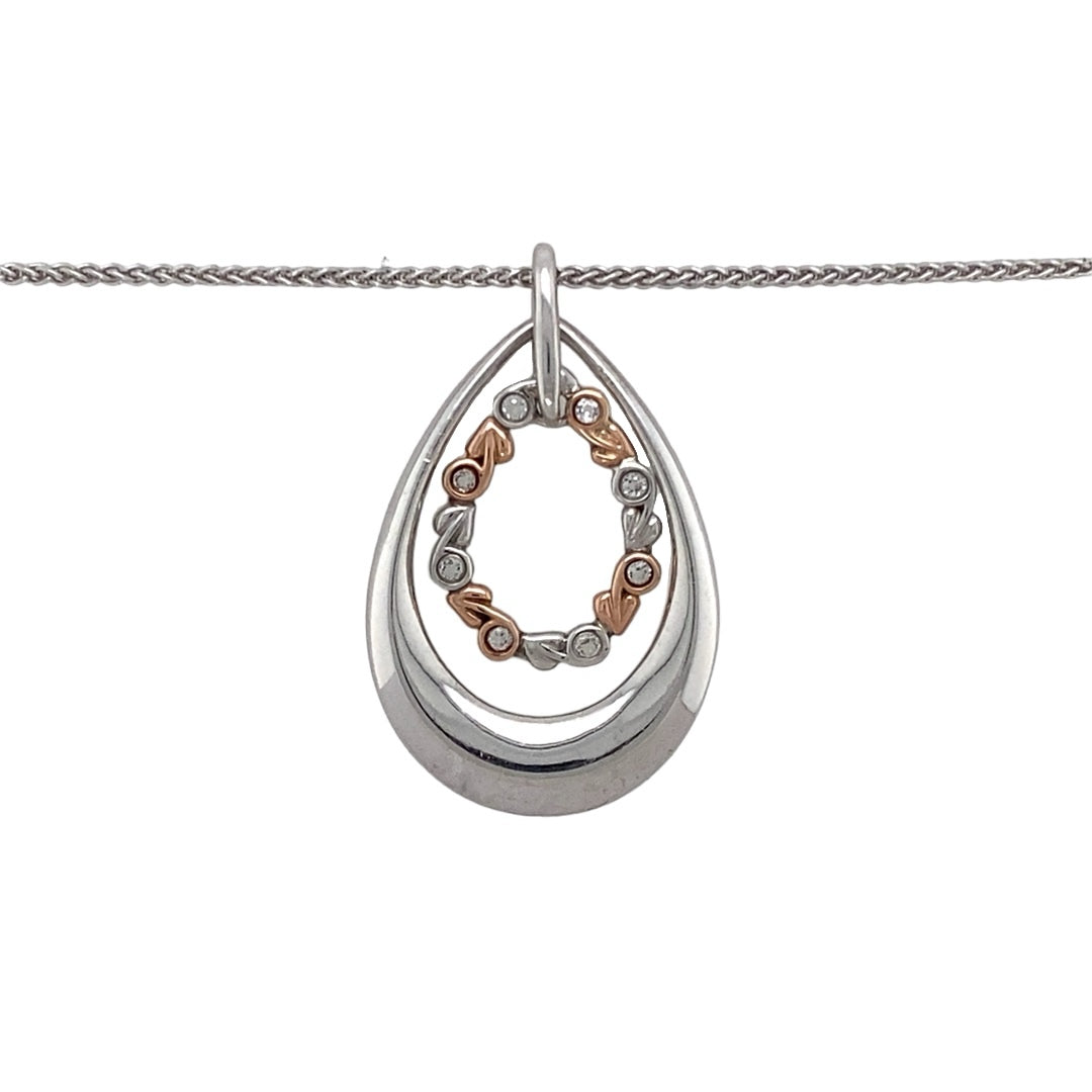 Preowned 925 Silver Clogau with 9ct Rose Gold & Cubic Zirconia Clogau Tree of life Teardrop Pendant on an 18" Clogau chain with the weight 7.70 grams. The pendant is 3.4cm long including the bail