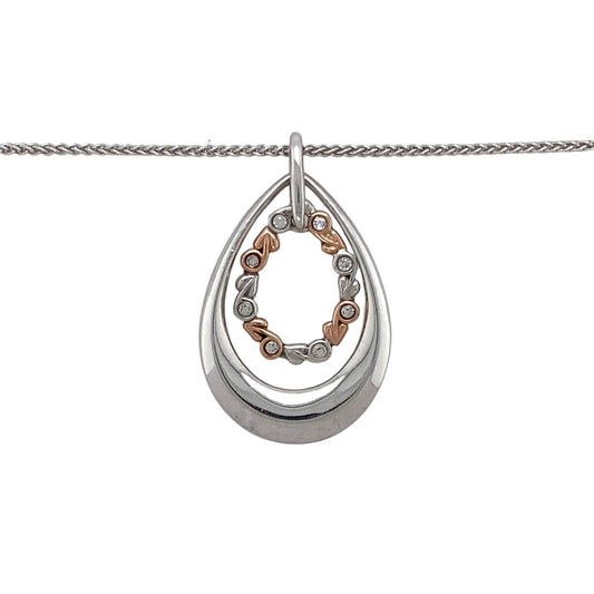 Preowned 925 Silver Clogau with 9ct Rose Gold & Cubic Zirconia Clogau Tree of life Teardrop Pendant on an 18" Clogau chain with the weight 7.70 grams. The pendant is 3.4cm long including the bail
