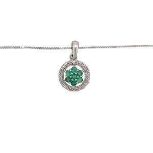Preowned 9ct White Gold Diamond & Emerald Set Flower Cluster Pendant on an 18" box chain with the weight 2.70 grams. The pendant is 2.1cm long including the bail and the emerald stones are each 2mm diameter
