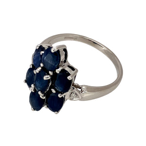 Preowned 9ct White Gold Diamond & Sapphire Set Cluster Ring in size N with the weight 3.90 grams. The sapphire stones are each 6mm by 4mm