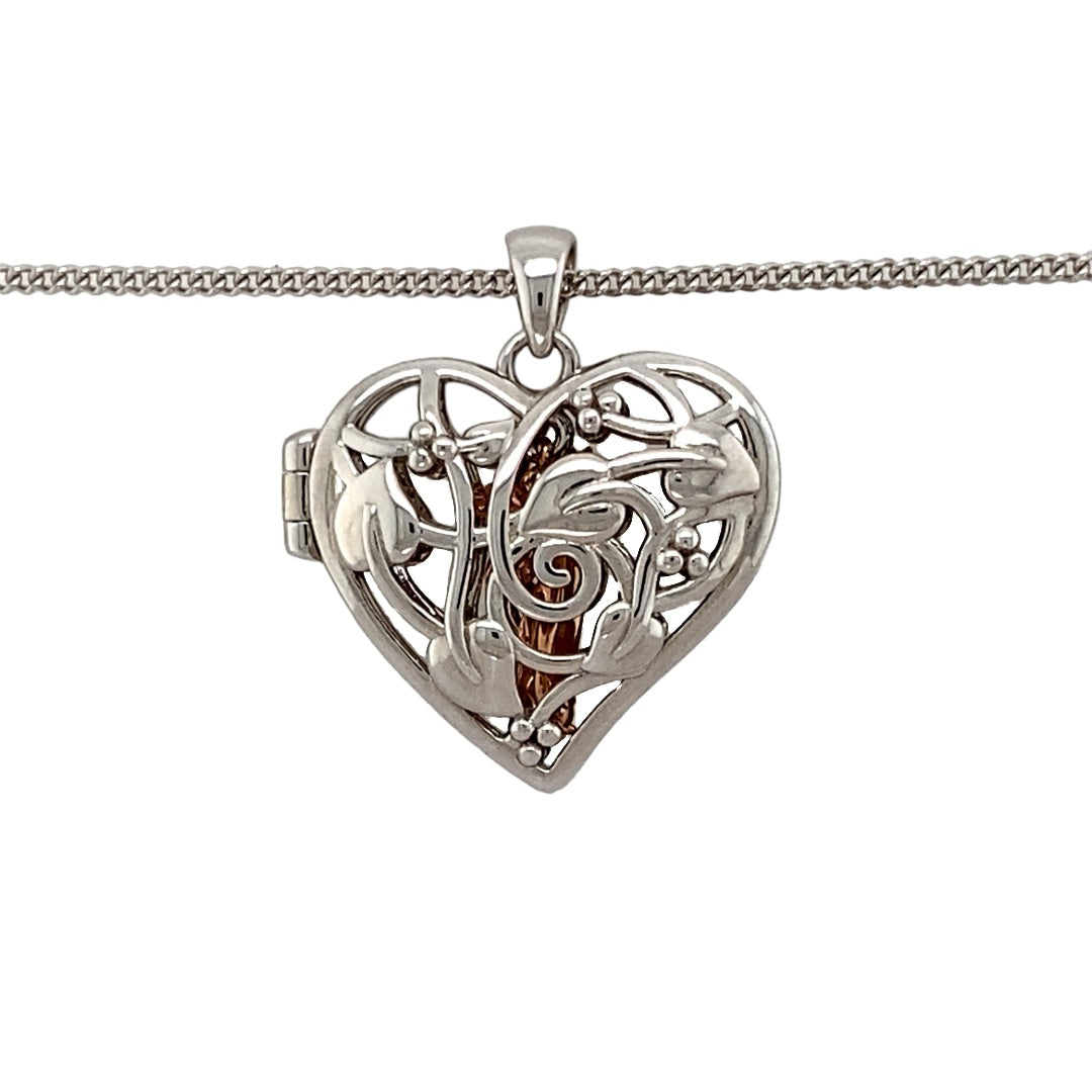 Preowned 925 Silver and 9ct Rose Gold Clogau Tree of Life Fairy Heart Locket Pendant on an adjustable 18", 20" - 22" Clogau curb chain with the weight 8.20 grams. The pendant is 2.7cm long including the bail