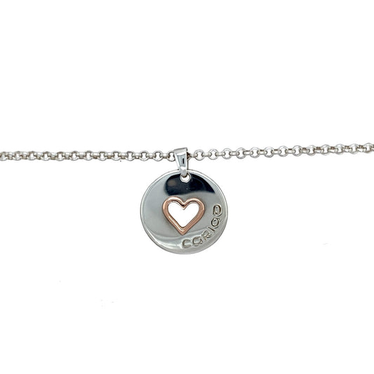 Preowned 925 Silver Clogau & 9ct Gold Rose Clogau Cariad Heart Pendant on an 18", 19" and 20" adjustable Clogau silver belcher chain. The necklace has the weight 14.30 grams and the pendant is 2.5cm long including the bail