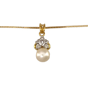 Preowned 18ct Yellow and White Gold Diamond & Pearl Pendant on a 19" box chain with the weight 5.50 grams. The pendant is 2.2cm long including the bail and the pearl is 8mm diameter