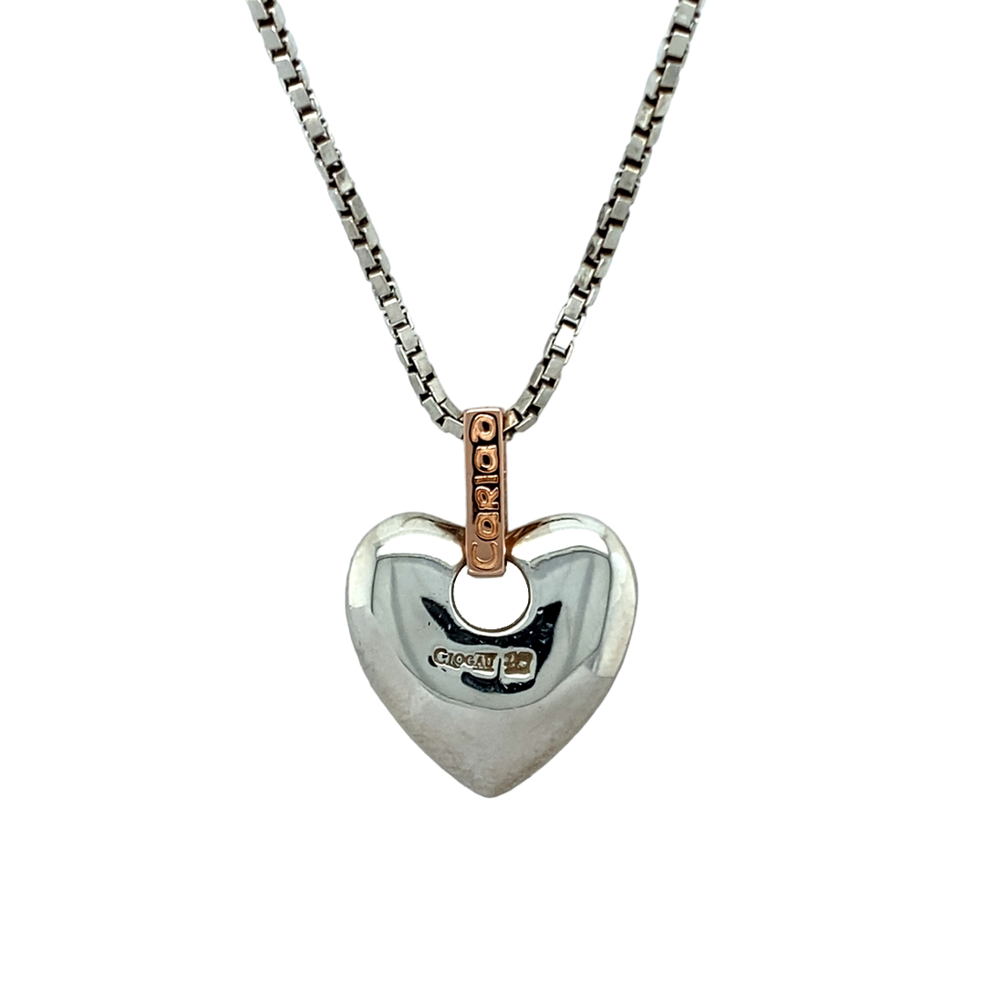 Preowned 925 Silver with 9ct Rose Gold Clogau Cariad Heart Pendant on a 18" Silver Clogau box chain. The necklace has the weight 17.20 grams and the pendant is 2.7cm long including the bail which has a Diamond set in it